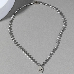 Pendentif tête de mort hip-hop en acier inoxydable avec yeux en cœur et chaîne