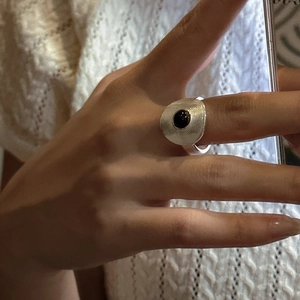 Retro S925 silver ring featuring a black agate bead with textured concentric circle design
