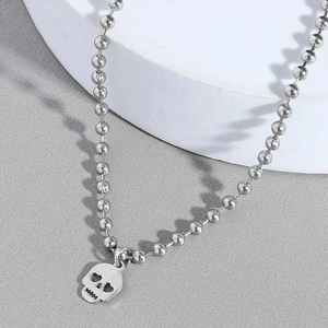 Collier hip hop punk en acier inoxydable avec pendentif tête de mort aux yeux en cœur