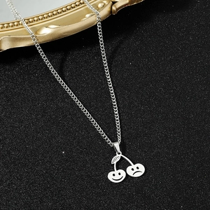 Collier homme en acier inoxydable avec pendentif cerise sourire et visage triste