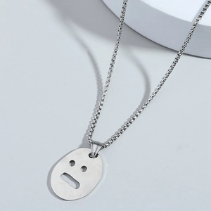 Minimalist silver stainless steel box chain necklace with a hollow face motif pendant
