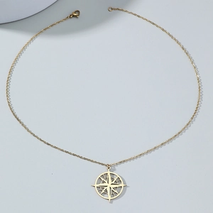 North Star disk pendant on golden O-chain necklace with minimalist compass design