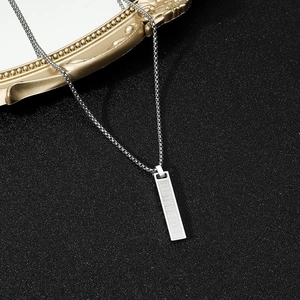 Men's silver square pillar necklace with Roman numerals on a black textured background