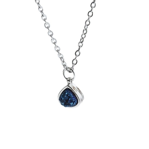 Elegant silver teardrop necklace with a blue druzy crystal pendant on a plain white background