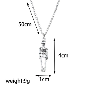 Detail shot of men's skeleton pendant necklace with size labels and dimensions