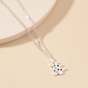 Silver Christmas tree pendant necklace with colorful rhinestones on a minimalist O-chain