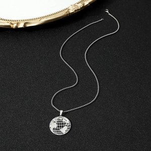 Close-up of hollowed-out earth globe pendant with polished stainless steel mesh chain