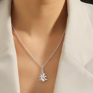 Elegant silver Christmas tree pendant necklace with colorful crystals on a dainty chain