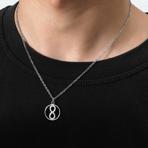 Minimalist round hourglass pendant with number 8 on O-chain for men, worn on black shirt