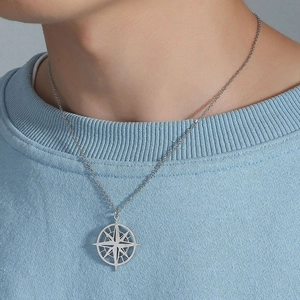 Minimalist North Star compass pendant necklace on a stainless steel O-chain for women and men