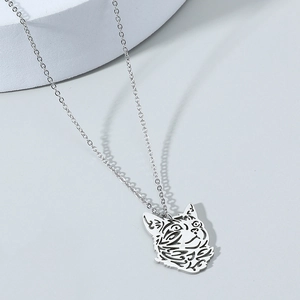 Minimalist hollow cat head pendant necklace made of stainless steel with a delicate link chain
