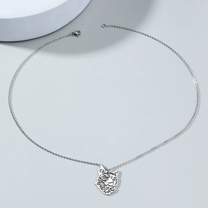 Minimalist stainless steel hollow cat pendant necklace with sleek silver chain