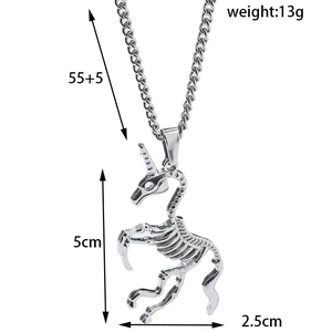 Detailed view of silver unicorn skull pendant showing 5cm height and 2.5cm width specs