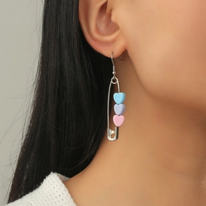 Safety pin drop earrings with macaron matte heart beads in pastel blue, purple, and pink