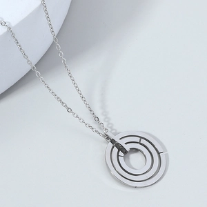 Three-ring tiered pendant necklace in silver stainless steel with geometric industrial design