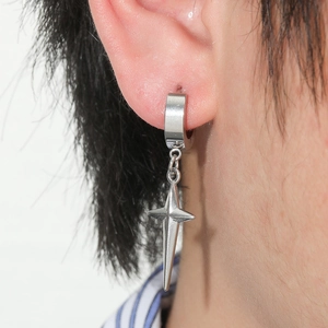 Silver stainless steel huggie earrings featuring a minimalist four-pointed star pendant
