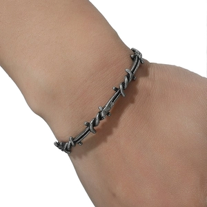 Retro silver woven punk bracelet with industrial twisted metal texture for street style