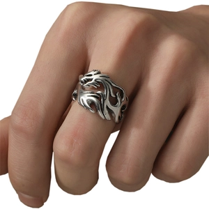Vintage silver dragon ring with flame relief pattern for men in minimalist studio style
