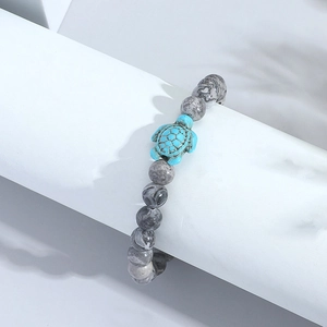 Minimalist turquoise turtle beaded bracelet with grey ink pattern natural stone beads