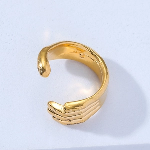 Adjustable golden skeleton hand ring in punk hip hop style with brushed metal texture