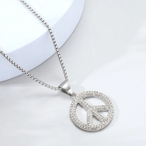 Silver iced out peace sign necklace with rhinestone pave pendant and box chain