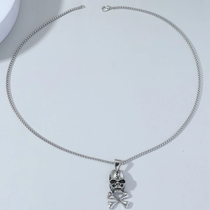 Silver skull and crossbones pendant necklace with punk gothic metal detailing
