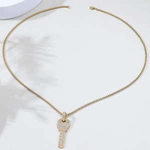 Collier hip hop doré avec pendentif clé orné de zircons cubiques et chaîne maille