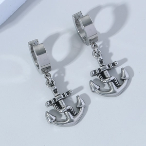 Detailed view of punk style anchor earrings with vintage textures and rope details