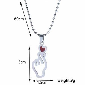 Detail of silver heart-finger pendant necklace showing dimensions 60cm chain and 3cm pendant