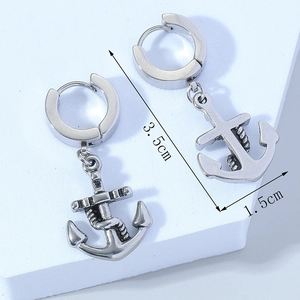 Macro shot of silver anchor drop earrings with engraved rope details and dimensions