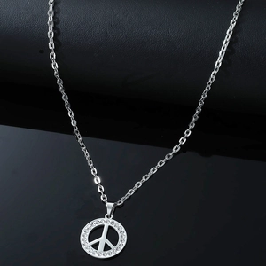 Pendentif symbole de la paix en acier inoxydable poli serti de cristaux brillants