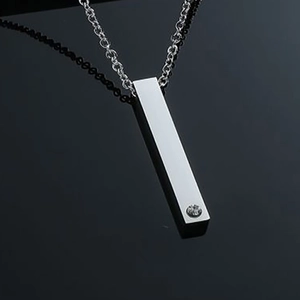 Minimalist stainless steel rectangular pendant necklace with a single cubic zirconia gem
