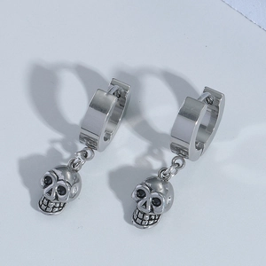 Vintage punk skull drop earrings in aged silver with black gemstone accents