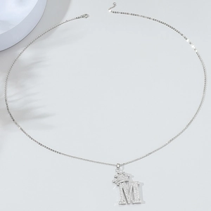 Silver M letter necklace with crown pendant and white cubic zirconia crystals