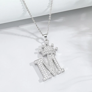 Iced out crown letter M pendant necklace with sparkling zircons in silver finish