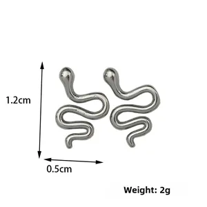 Detailed view of silver snake earrings with dimensions 1.2cm height and 0.5cm width