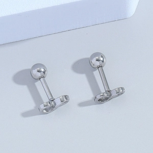 Detailed close-up of S925 hallmark on silver infinity symbol barbell stud earring