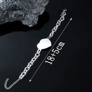 Close-up of heart tag bracelet showing 18+5cm size details and lobster clasp