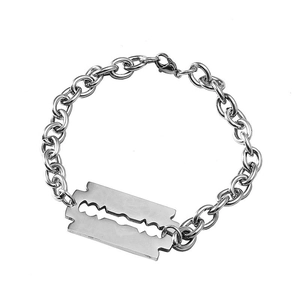 Industrial punk bracelet featuring chunky silver metal links and a stainless razor blade charm