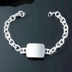 Polished stainless steel chain bracelet featuring a blank engravable ID plate and lobster clasp