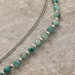 Minimalist double-layered necklace featuring silver curb chain and green agate beads