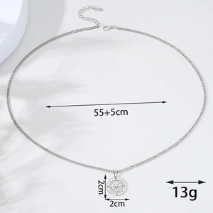 Vintage silver compass pendant necklace for men with engraved NESW symbols and a polished finish