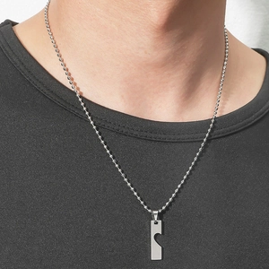 Minimalist silver stainless steel ball chain necklace with a heart puzzle pendant for men