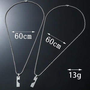 Detail showing 60cm ball chain and 13g silver heart pendant necklace set for couples
