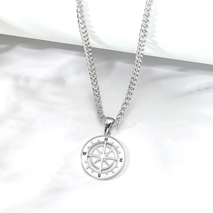 Retro silver compass pendant with N/W/S/E engraving on a Cuban chain for men