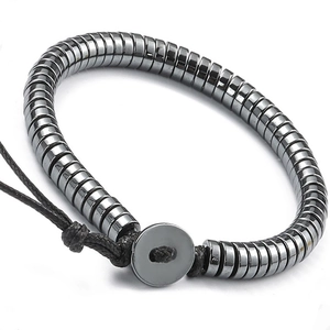Men's hematite disc bead bracelet with black woven cord and circular metal clasp