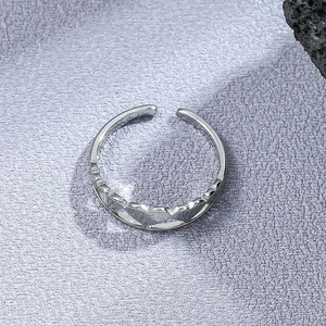 Adjustable silver stainless steel open ring featuring minimalist hollow heart patterns