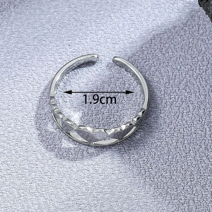 Top view of adjustable silver heart ring showing 1.9cm inner diameter measurement
