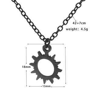Detail view of black punk sun pendant necklace showing 18mm size and 42cm chain length