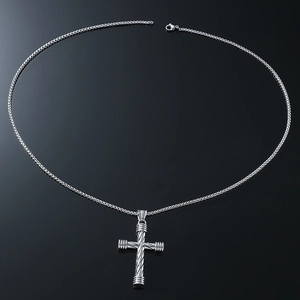 Minimalist silver cross necklace with spiral texture on black reflective background